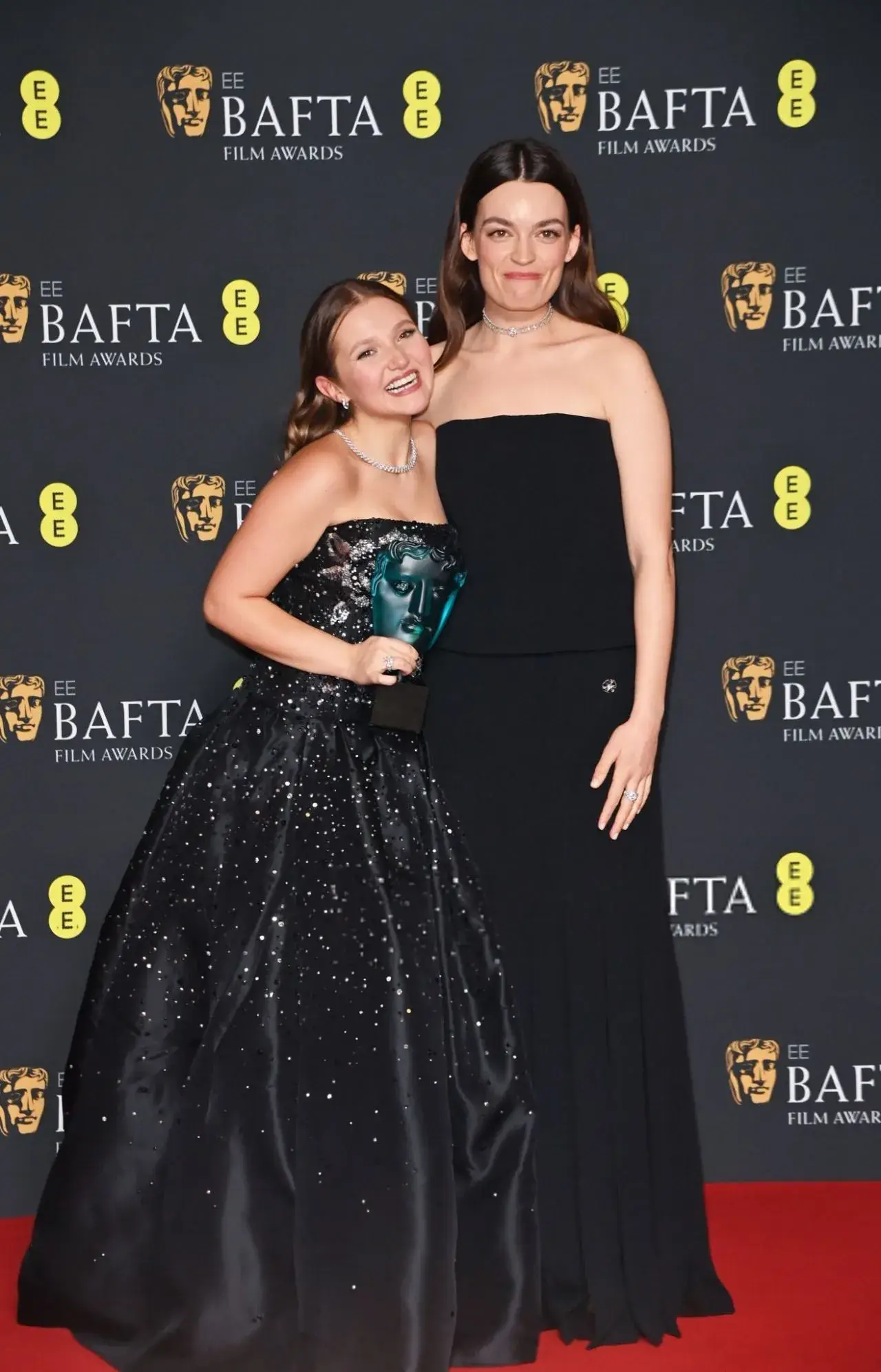 EMMA MACKEY STILLS AT EE BAFTA FILM AWARDS 2024 IN LONDON 8